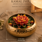 Kamal Jyoti artisan floral candle with decorative elements on a textured surface